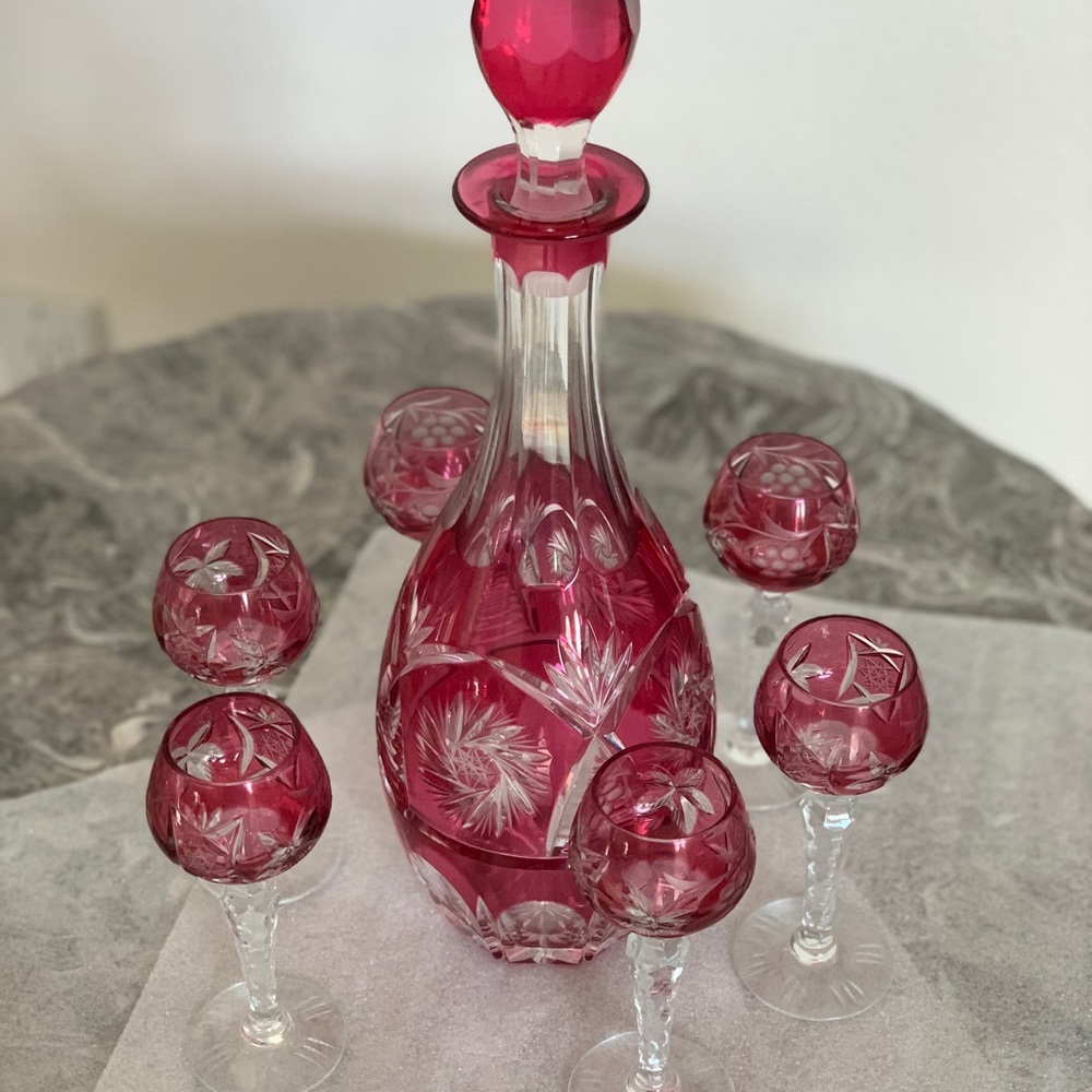 Vintage Imperlux cranberry colored crystal decanter with 6 Cordial glasses.